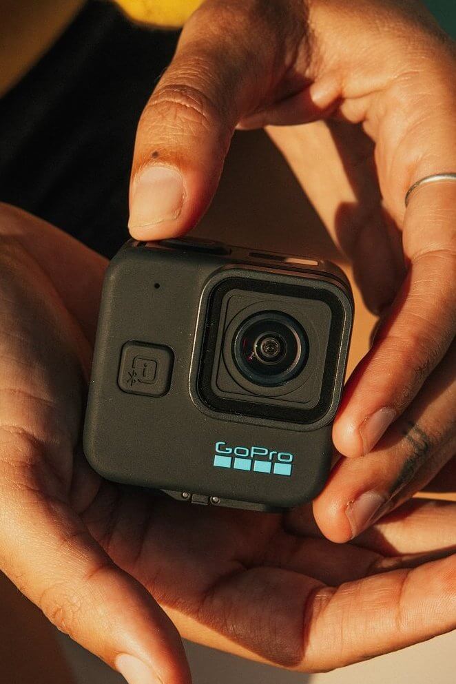 Man holding the new GoPro Mini.